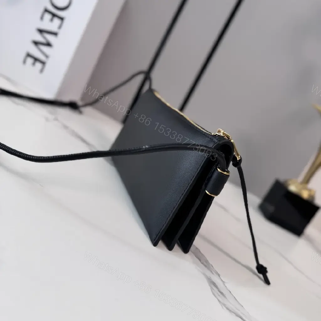 View 8 of Chic Black Leather Crossbody with Gold Hardware