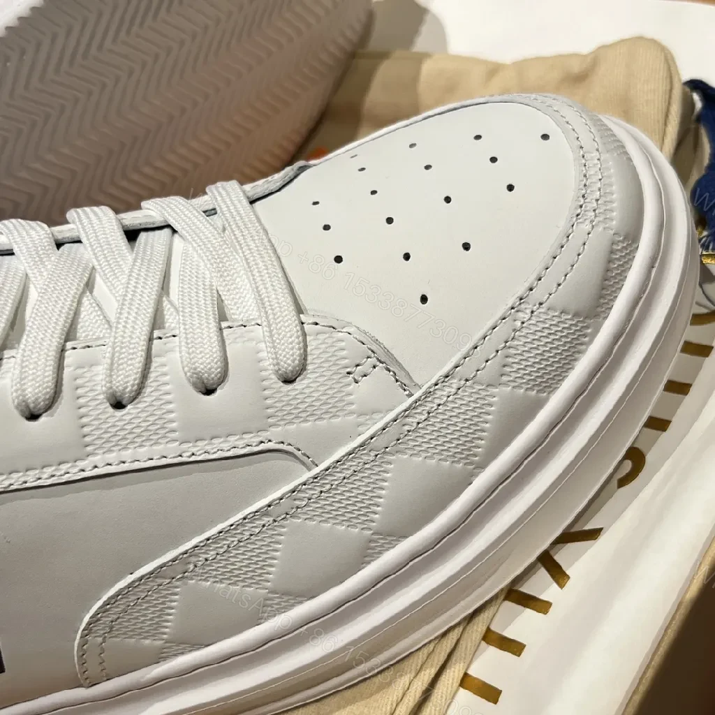 View 6 of White Leather High-Top Sneakers: Subtle Luxury Detailing