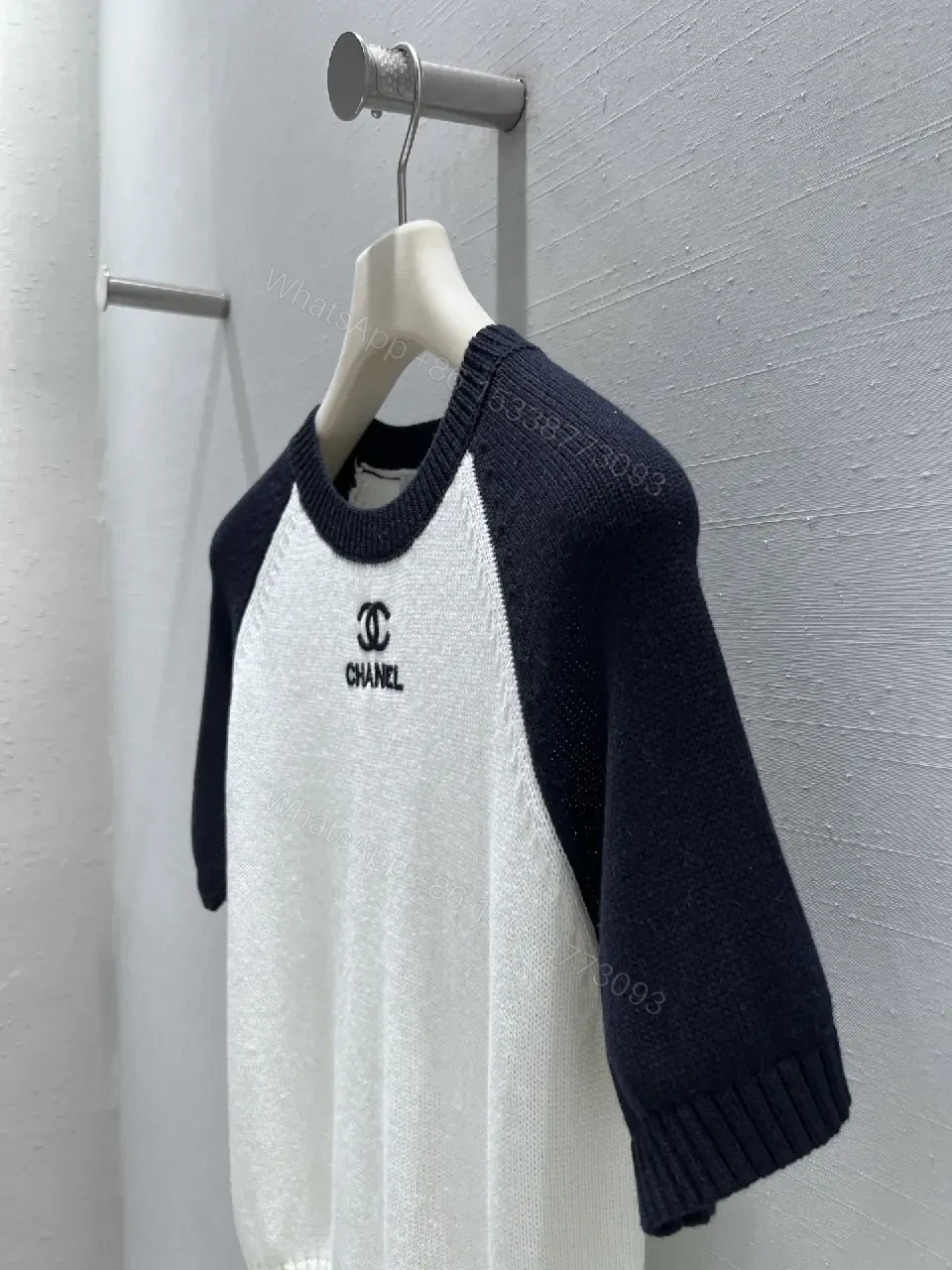 View 5 of Two-Tone Knit Tee with Signature Logo Emblem - Modern Luxury Casual