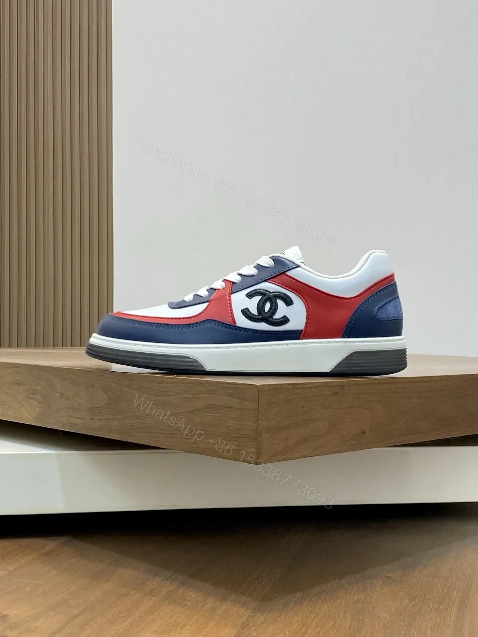 View 5 of Bold Color-Blocked Leather Sneakers with Logo Detail