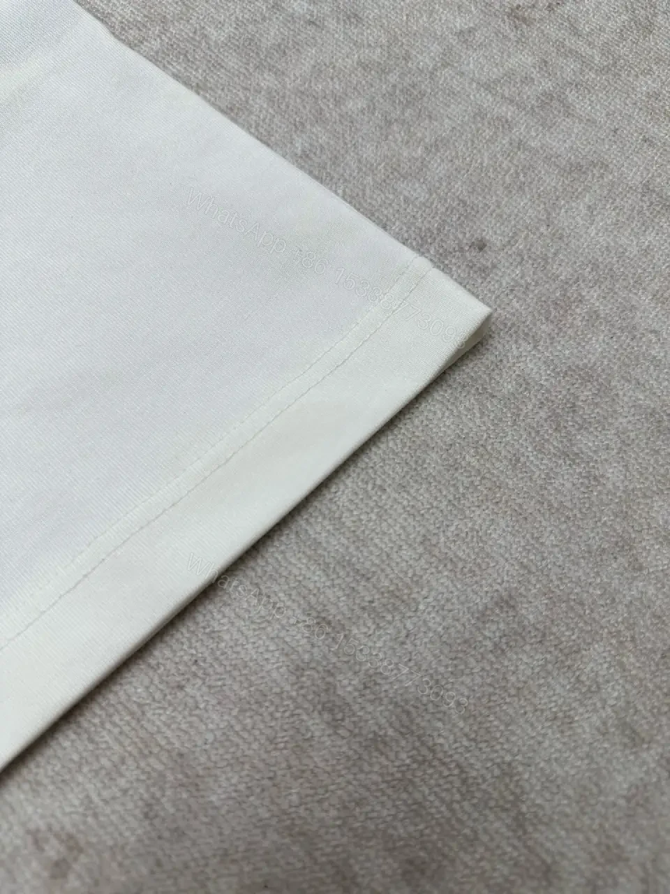 View 4 of Minimalist Luxe White Crewneck with Subtle Embossed DetailTop