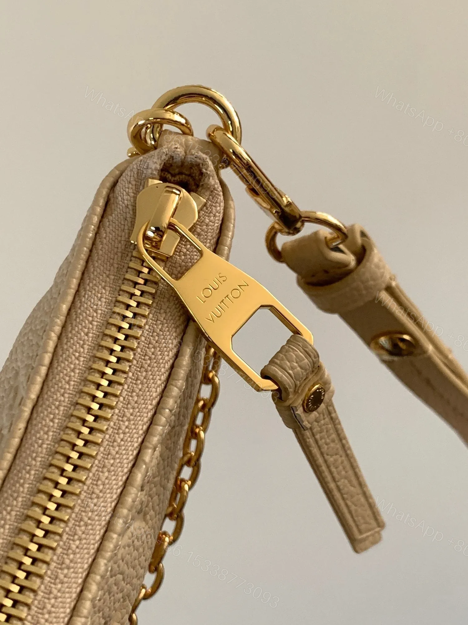 View 4 of LV EASY POUCH ON STRAP 19 IN BEIGE MONOGRAM EMPREINTE LEATHER