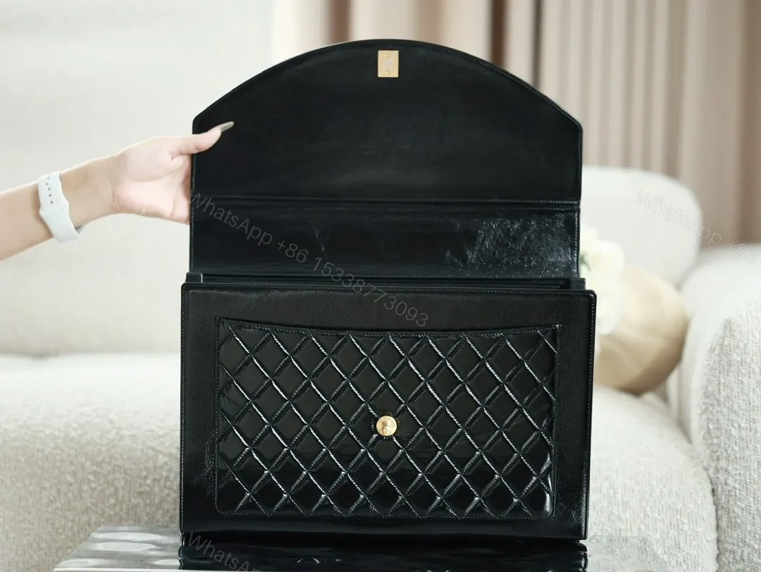 View 9 of Compact Quilted Leather Handbag with Gold Hardware