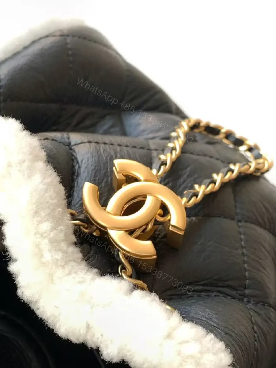 View 10 of Quilted Mini Bag with Faux Shearling Trim - Compact Luxury