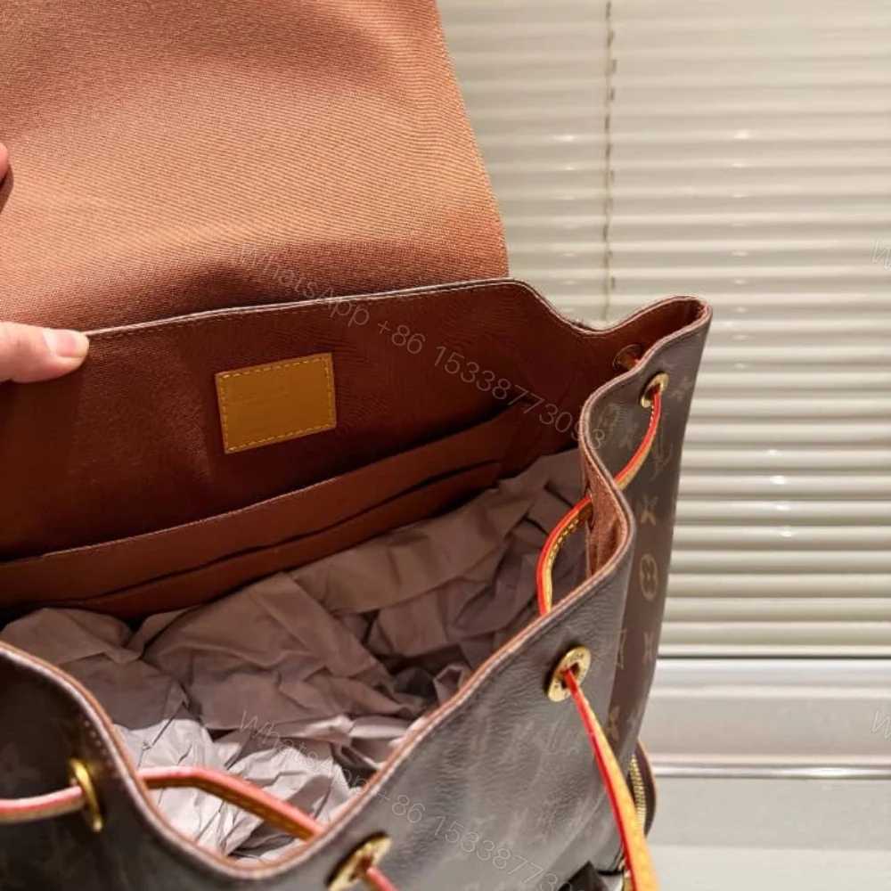 View 8 of Louis Vuitton Trio Backpack Monogram Canvas Brown 43Cm M44658