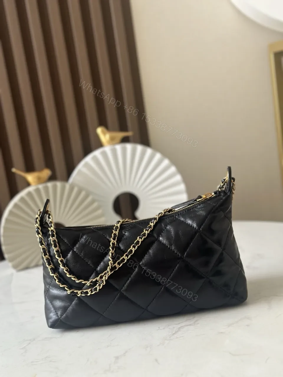 View 2 of Quilted Black Leather Shoulder Bag — Timeless Luxury, Day-to-Night