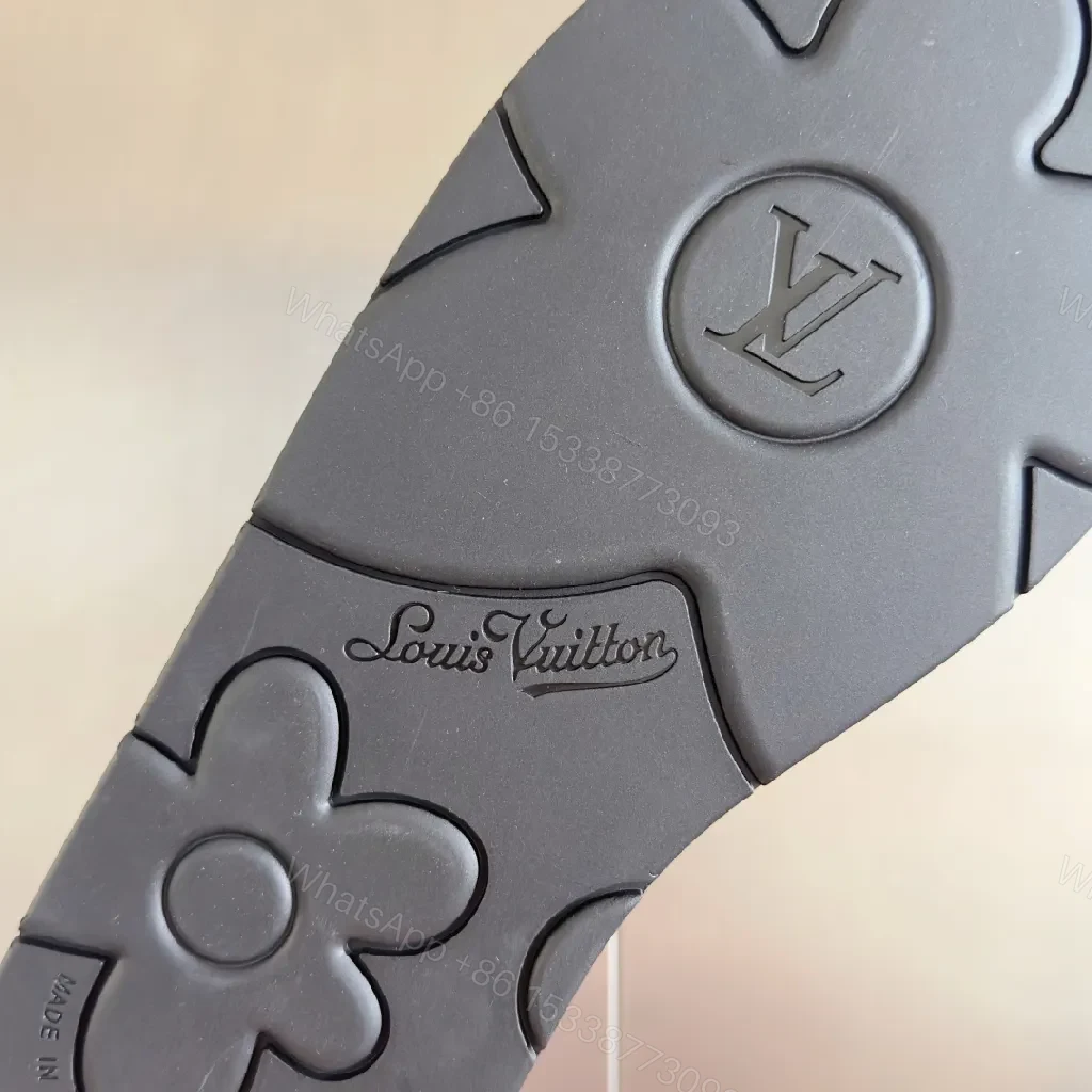 View 8 of Minimalist Black Leather Slides with Signature Emblem