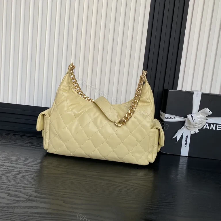 View 3 of Chic Quilted Weekender Bag in Soft Yellow with Gold Chain Handles
