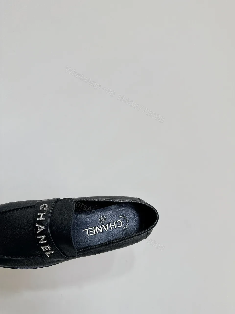 View 4 of Black Leather Slip-On with Logo Strap – Modern Luxe Comfort