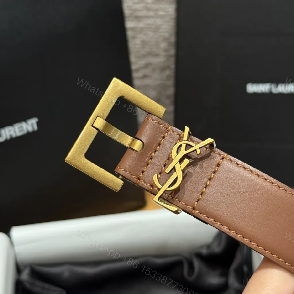 View 2 of Brown Leather Belt with Gold Logo Buckle—Versatile Luxury Accessory