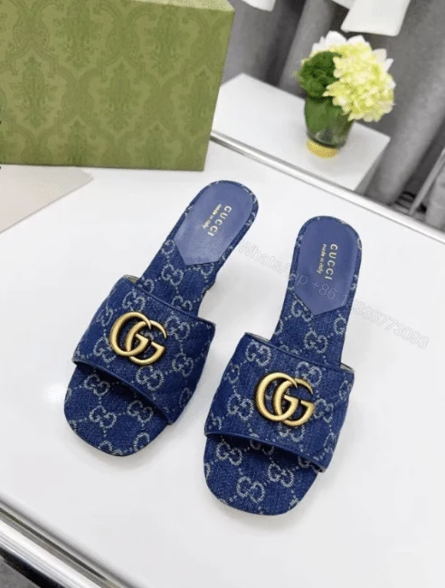 View 2 of Gucci Women’S GG Denim Sandals