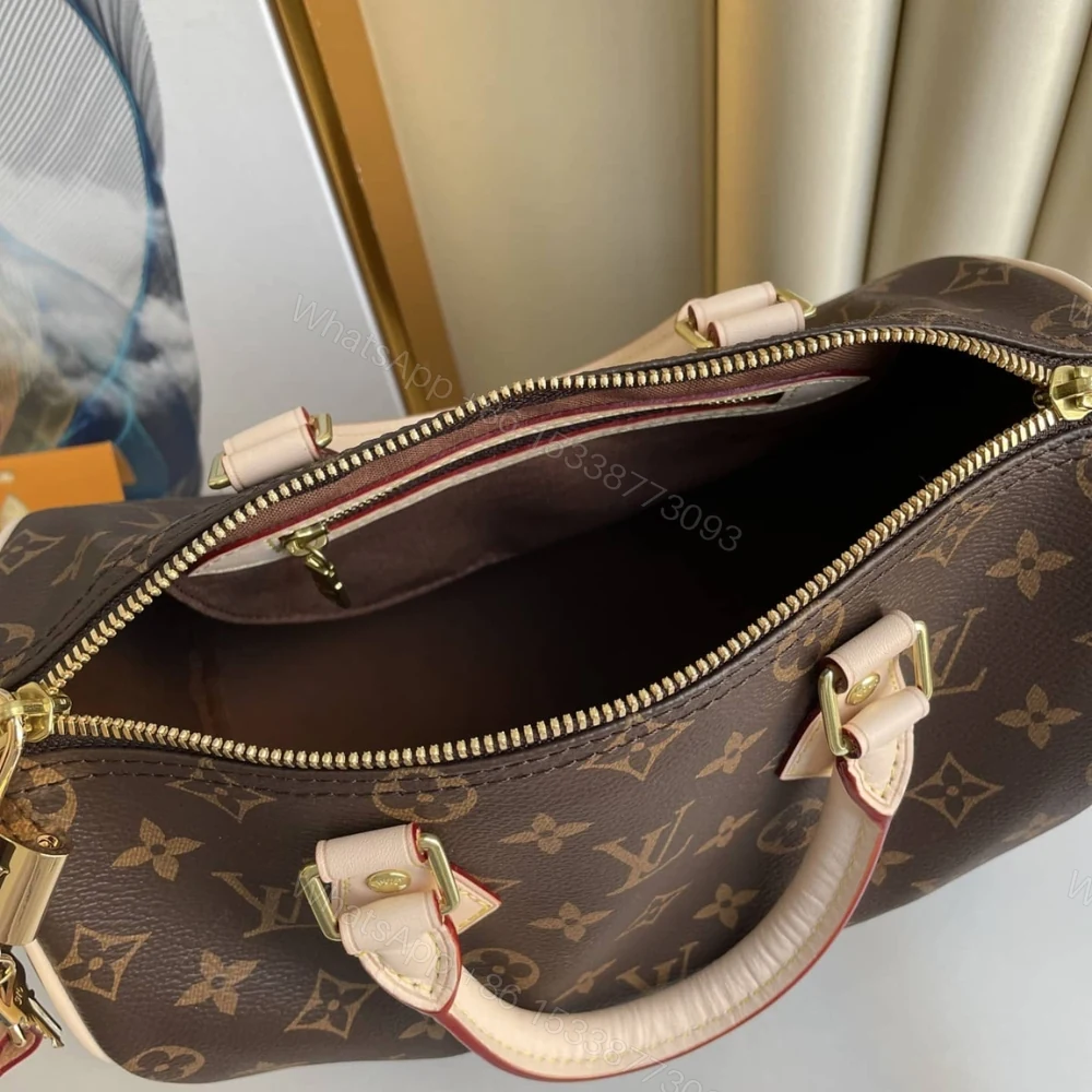 View 8 of Louis Vuitton Speedy Bandoulière 25 Brown 25Cm M41113