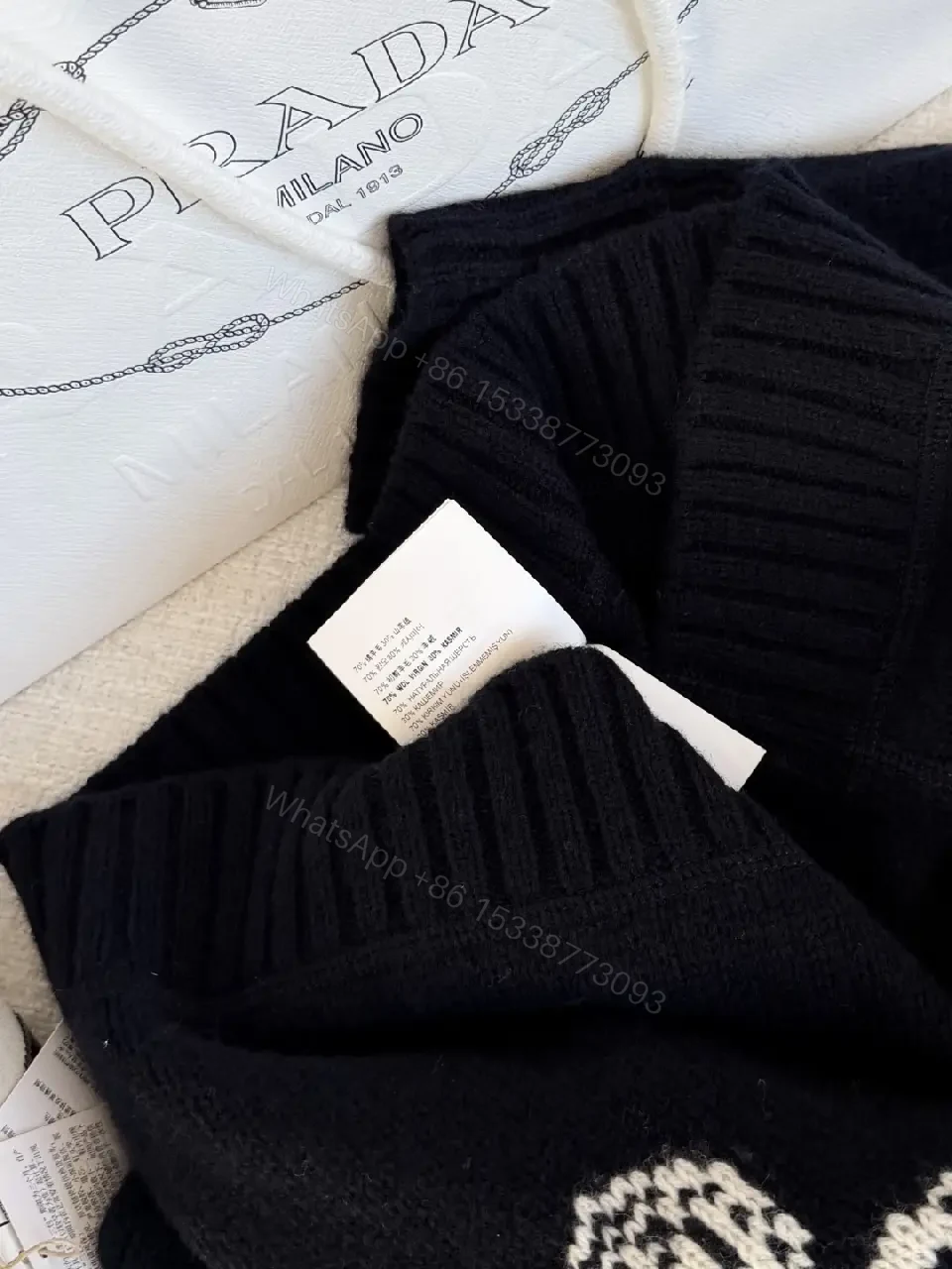View 7 of Black Knit Logo Crest Luxe Sweater, Relaxed Fit, Premium Knit