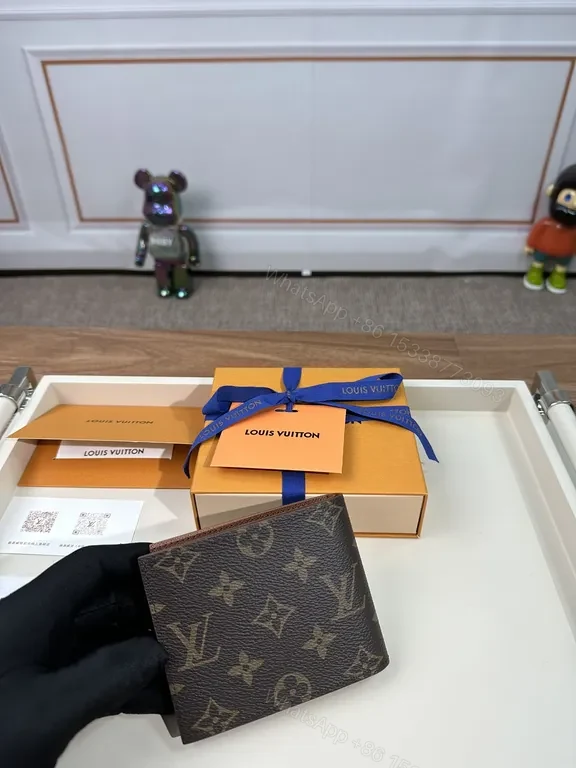 View 7 of Monogram Leather Wallet: Classic Louis Vuitton Bi-Fold, Slim Profile