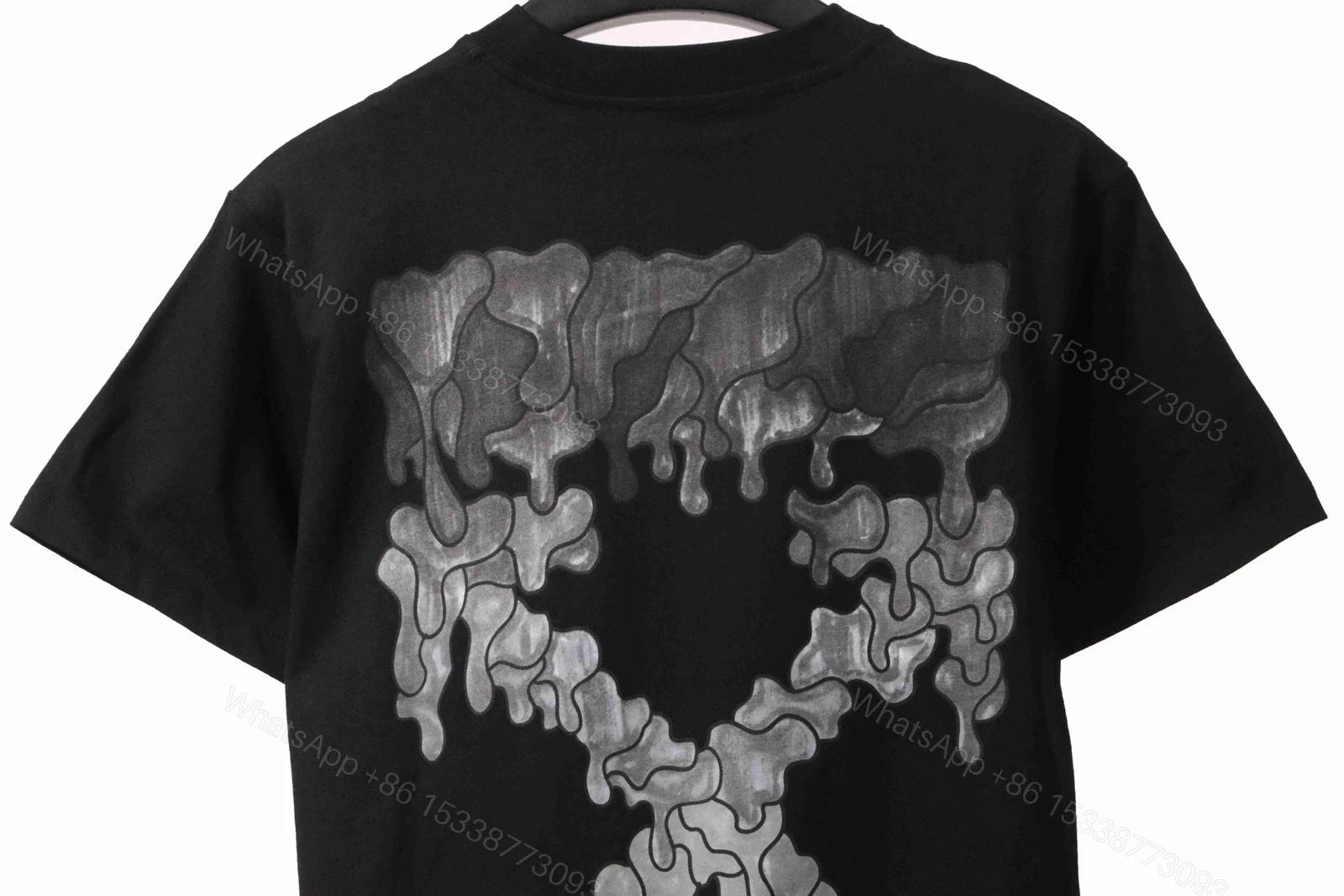 View 2 of Off-White Melting Arrow Print T-Shirt Black Brown