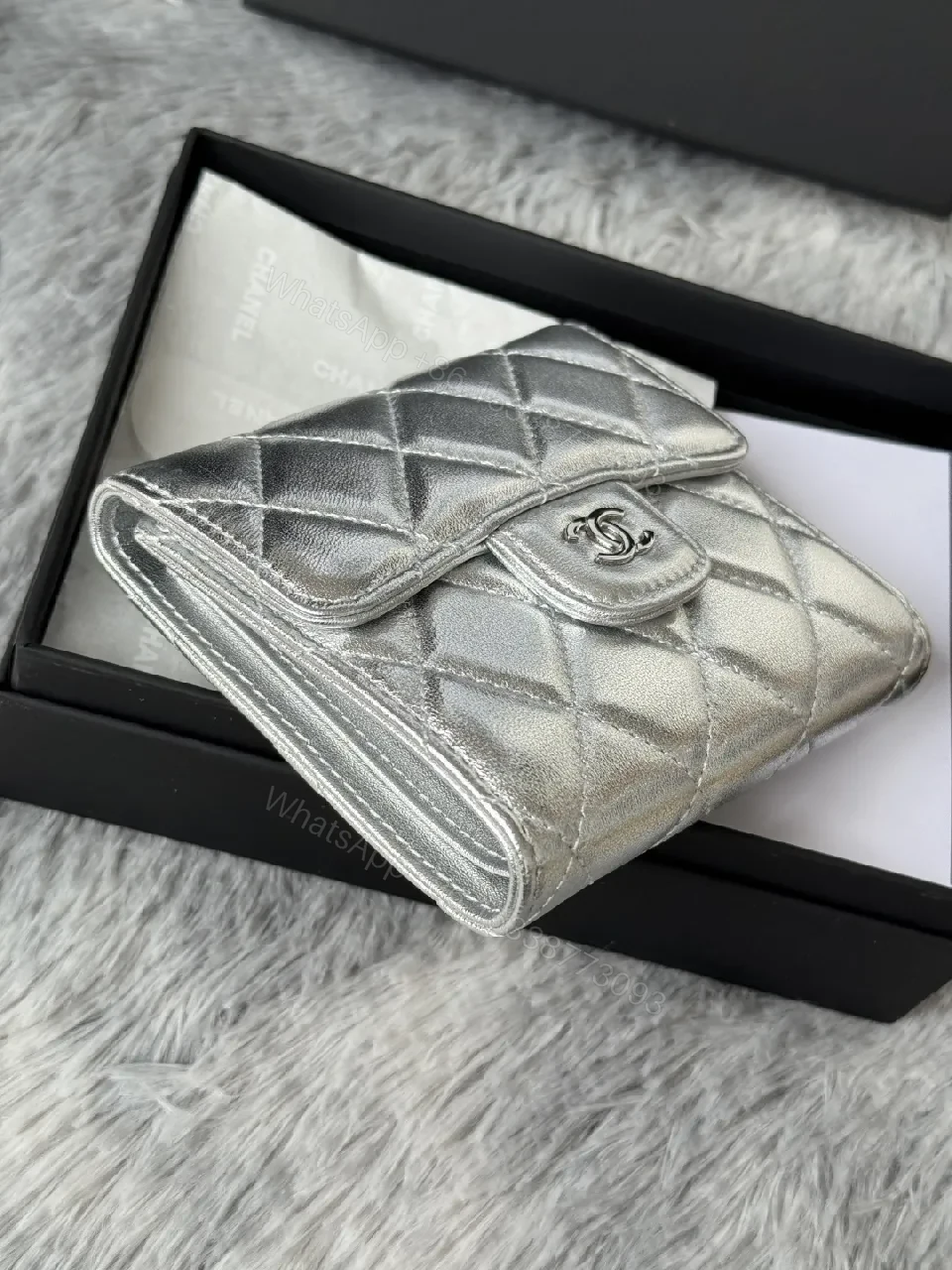 View 3 of Compact Silver Quilted Wallet with Signature Hardware