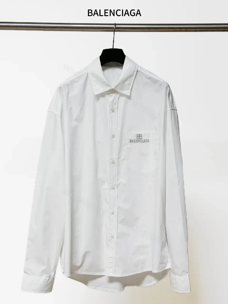 View 7 of Minimalist Button-Front Shirt with Subtle Logo Detail