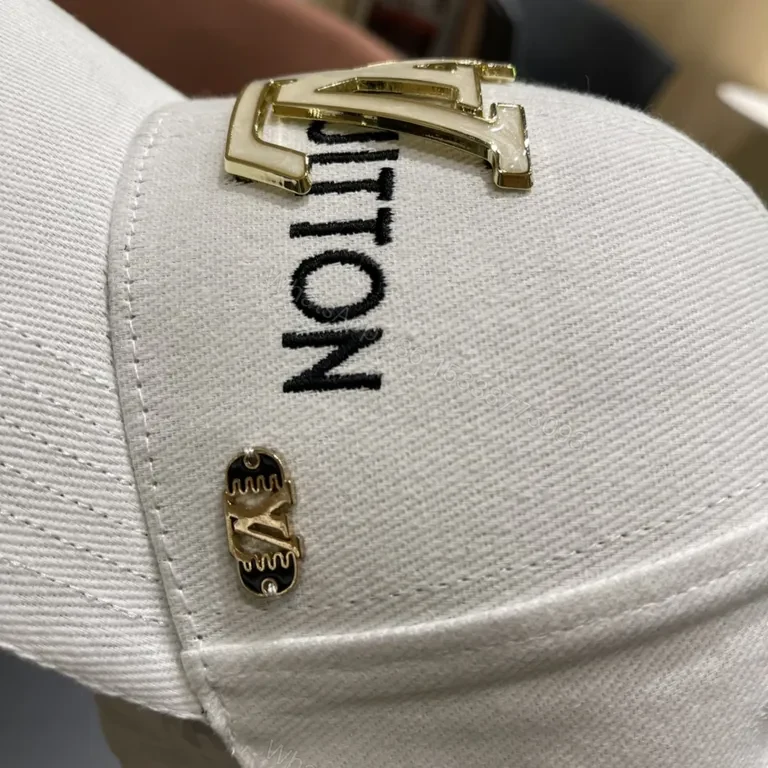 View 5 of Textured Cotton LV Cap: Gold Emblem Luxury Baseball Hat