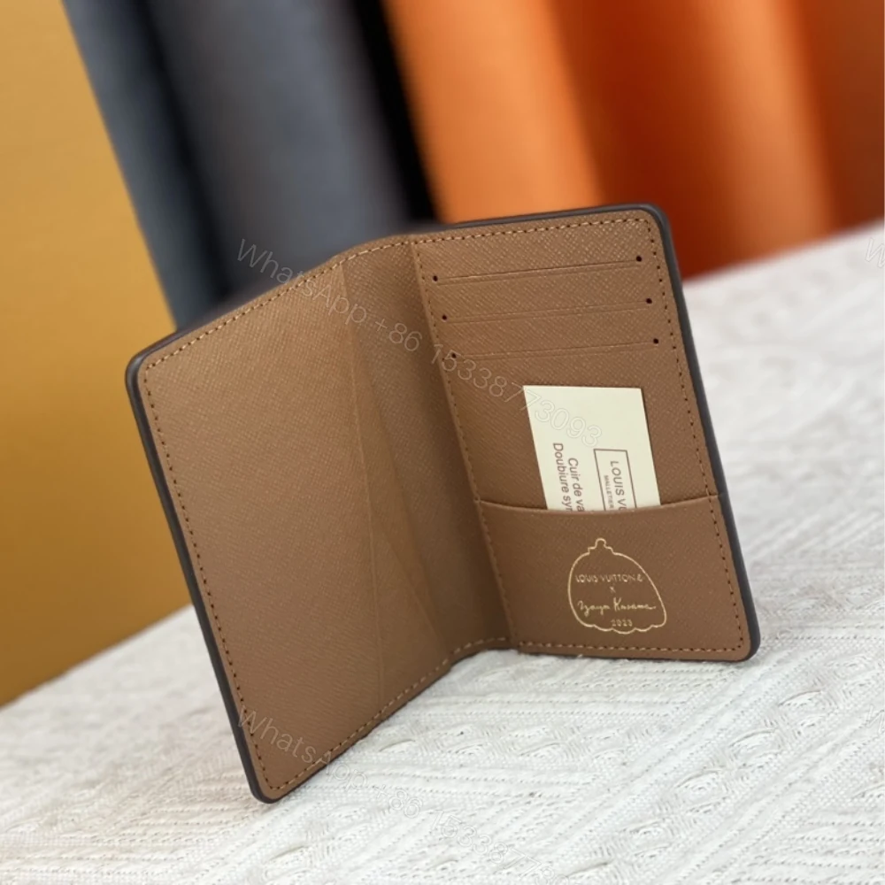 View 3 of LOUIS VUITTON VERTICAL WALLET x YK PUMPKIN MONOGRAM ECLIPSE CARD HOLDER BROWN 9CM