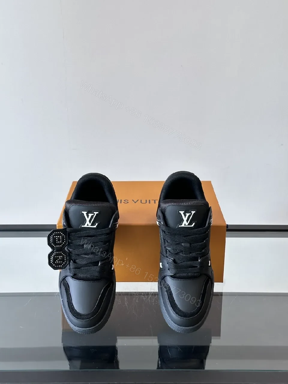 View 2 of Minimalist Black Leather Sneakers: Subtle Luxe Detailing High-Top