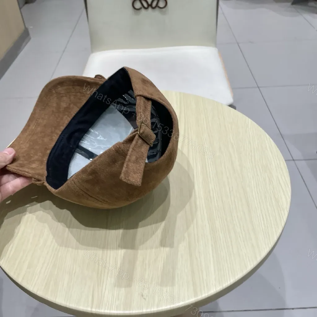 View 3 of Brown Suede Cap with Gold Emblem - Textured Luxury Cap