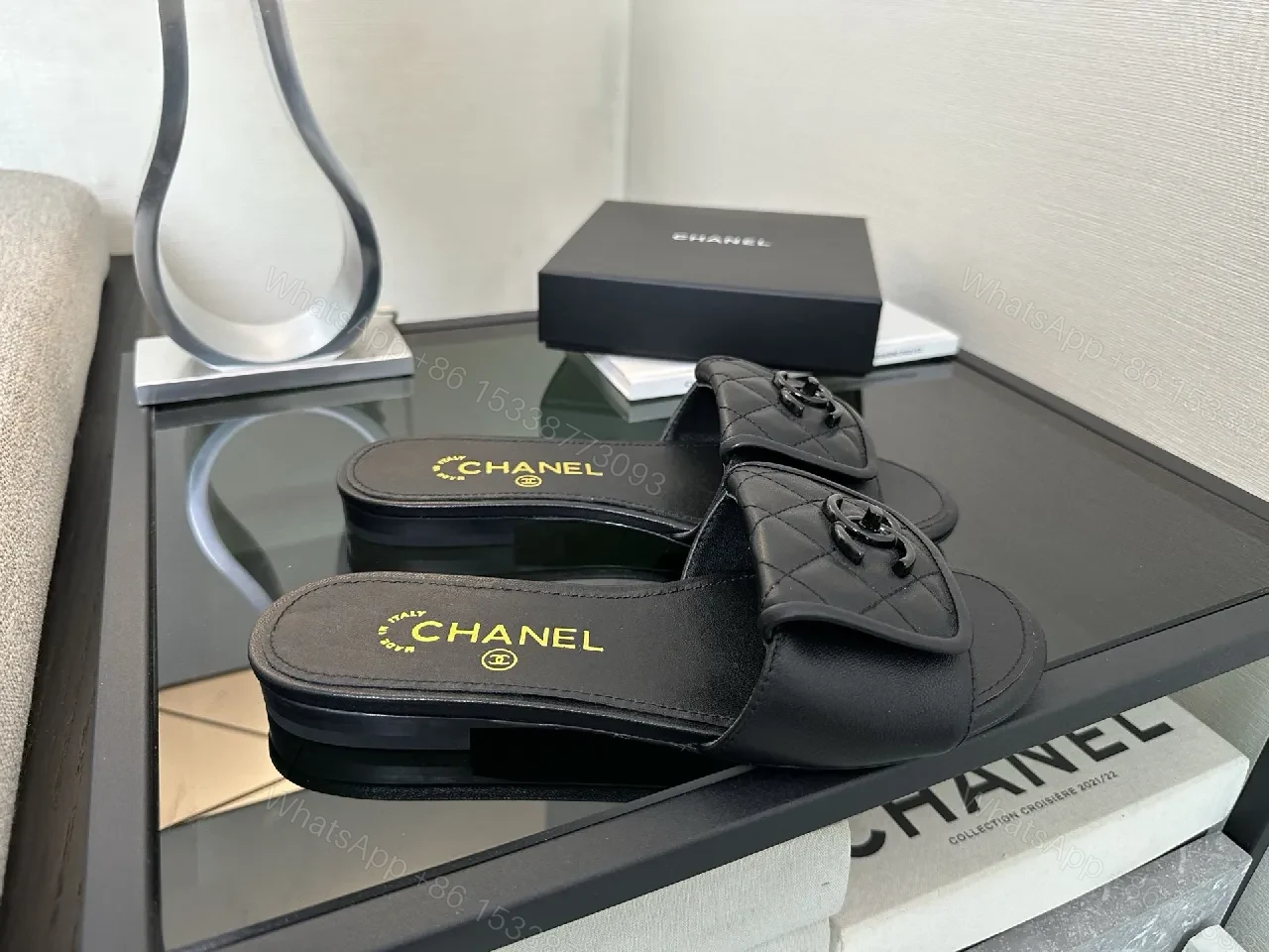 View 8 of Chic Black Quilted Slides with Logo Detailing