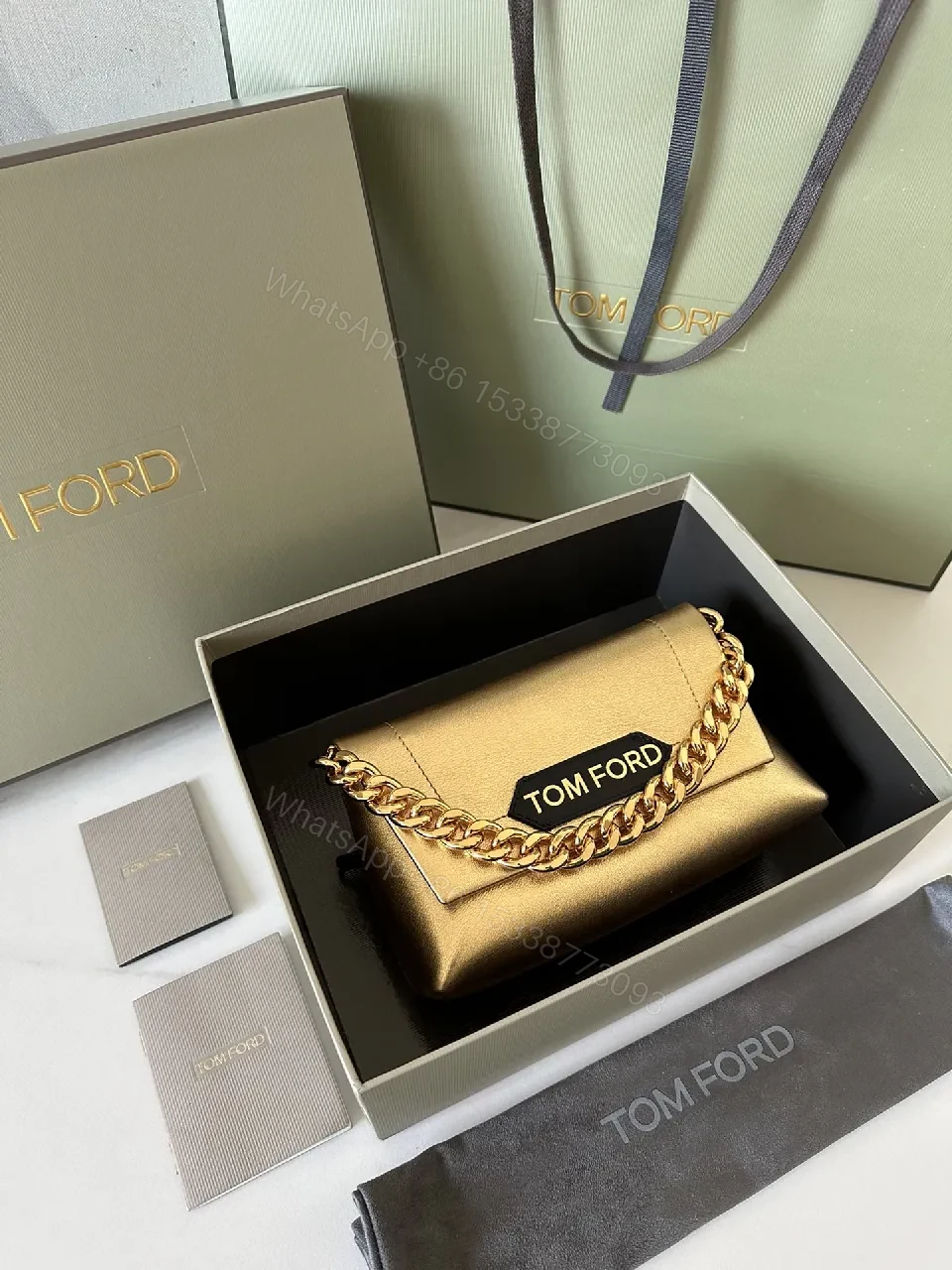 View 5 of Glossy Gold Chain Wallet in Luxe Leather