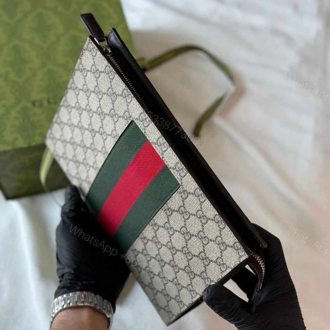 View 4 of GUCCI WEB WRISTLET SUPREME CLUTCH GG