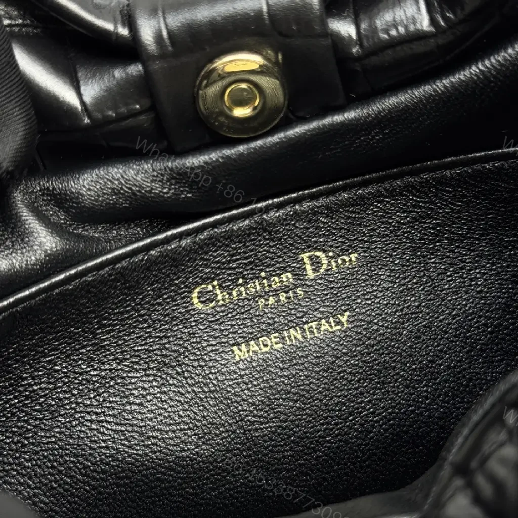 View 5 of Croc-Texture Bow Clutch: Leather Luxury, All-Day Glam