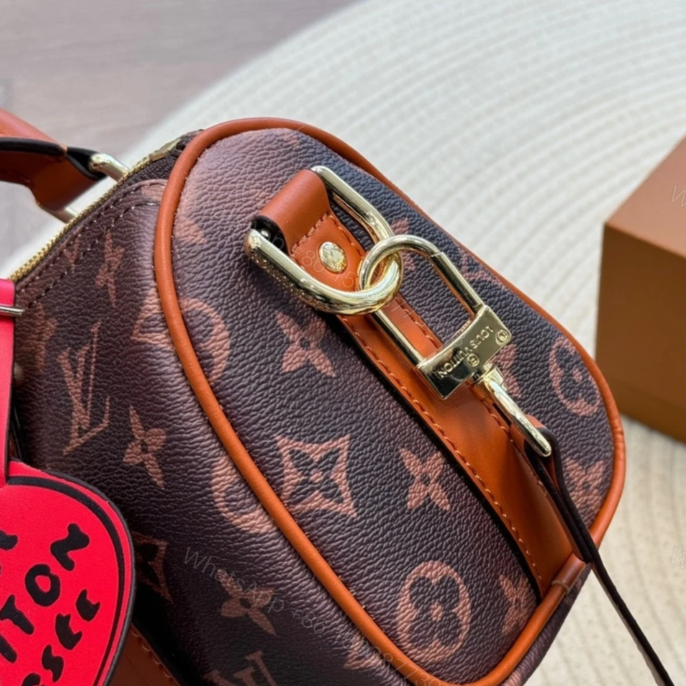 View 7 of Louis Vuitton Keepall Bandoulière 25 Monogram Dust Coated Canvas Brown 25Cm M11542