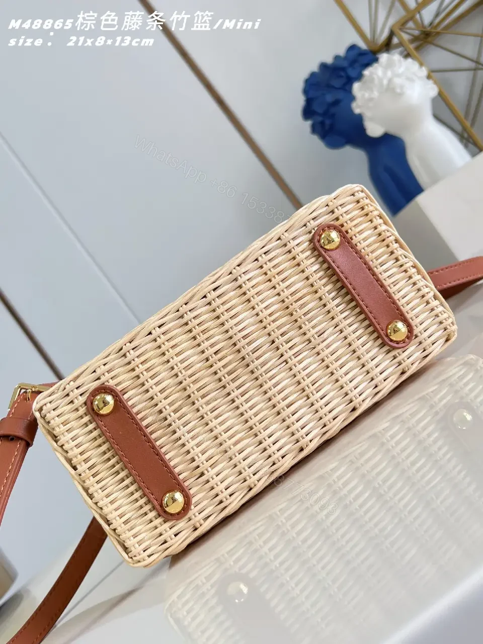 View 3 of Natural Beige Woven Leather-Trim Handbag with LV Emblem