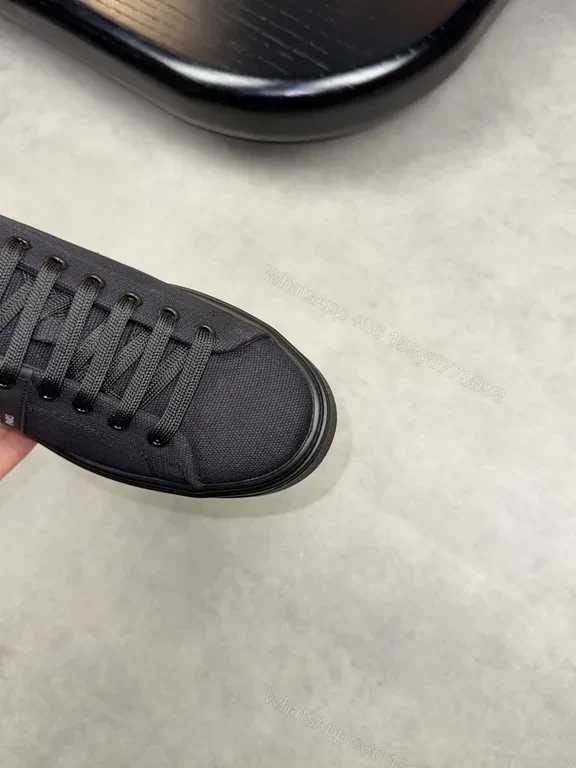 View 9 of Minimalist Black Knit Sneaker â€” Subtle LV Accent, All-Day Comfort