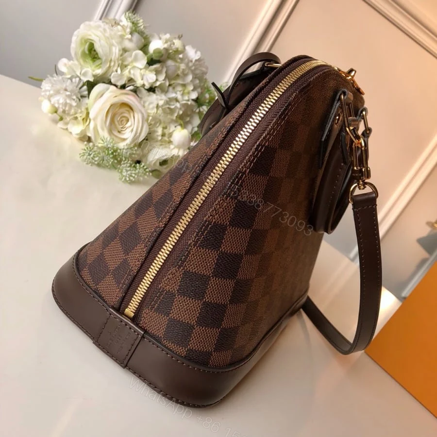 View 2 of Louis Vuitton Alma PM Damier Ebene Brown 32Cm N53151
