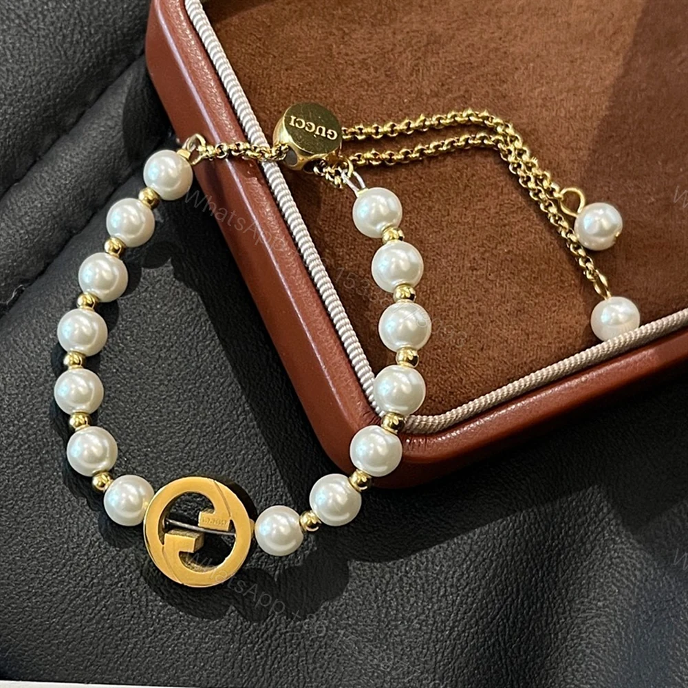View 2 of Gucci Interlocking Pearl Bracelet Gold ‎839033 JCF27 8062