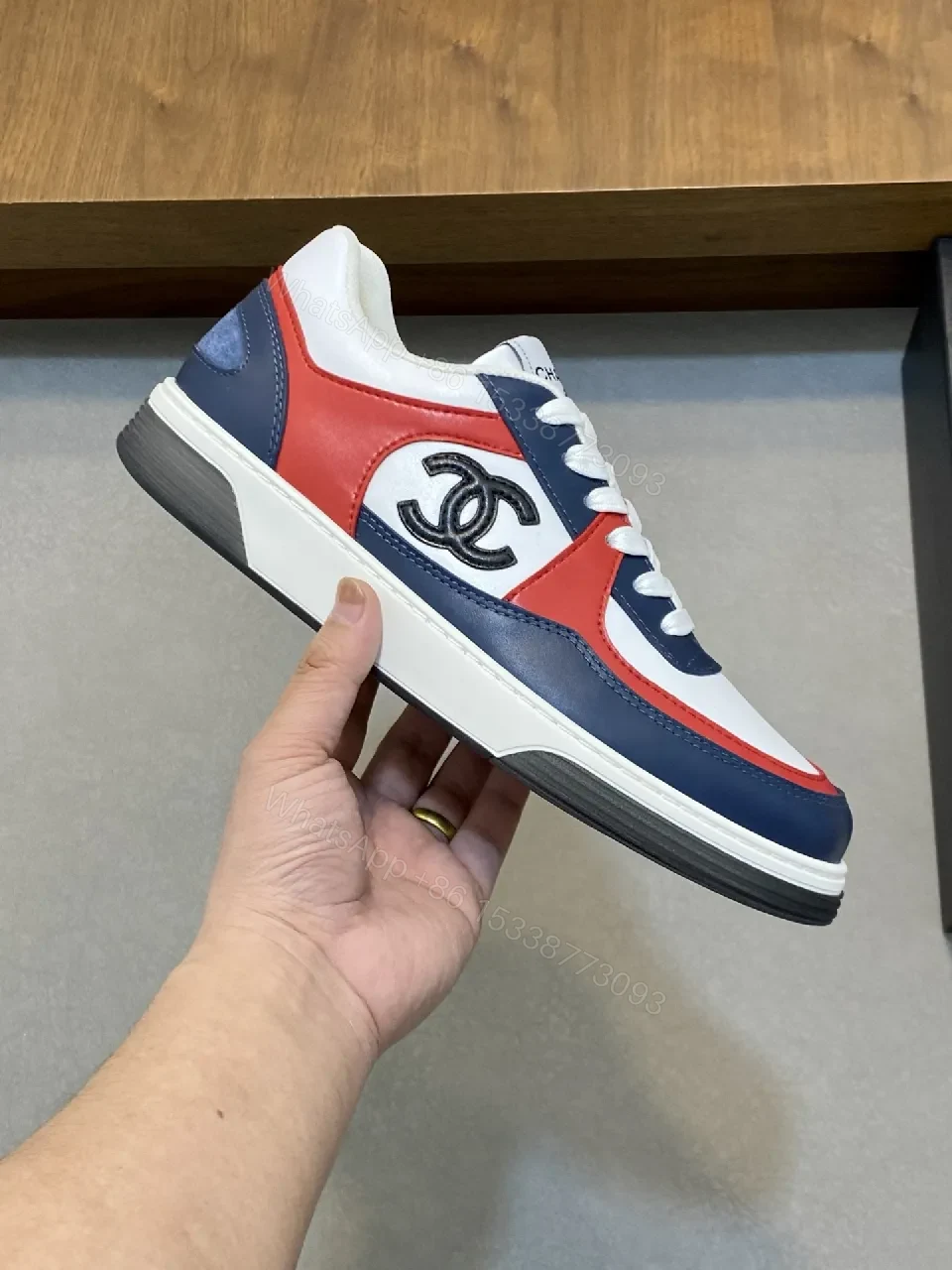 View 8 of Bold Color-Blocked Leather Sneakers with Logo Detail