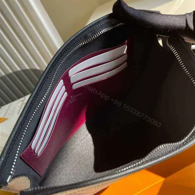 View 3 of LOUIS VUITTON POCHETTE VOYAGE MM TAIGA LEATHER M30718