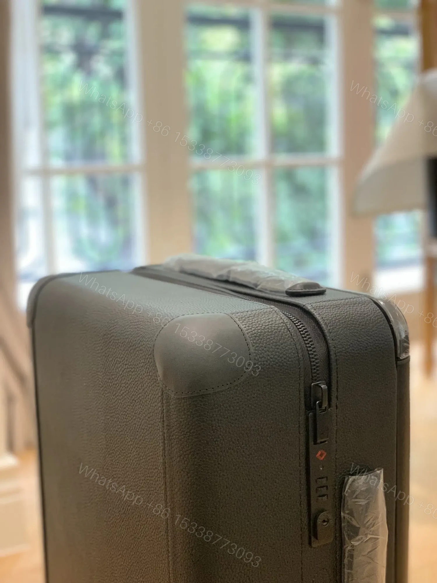 View 5 of Louis Vuitton Horizon 55 rolling suitcase in Black