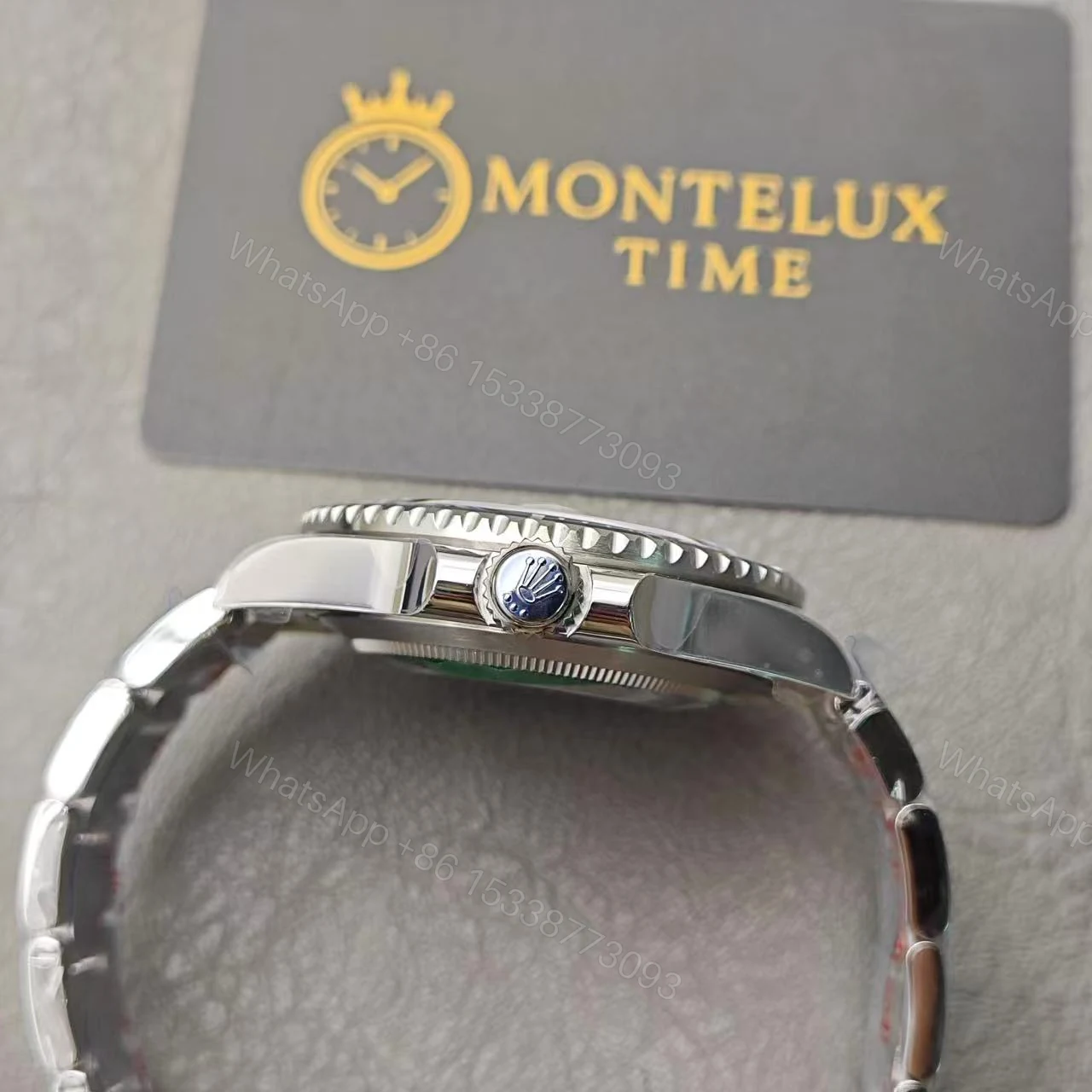 View 11 of Replica Rolex Submariner – Silver/Black 40mm 116610LN