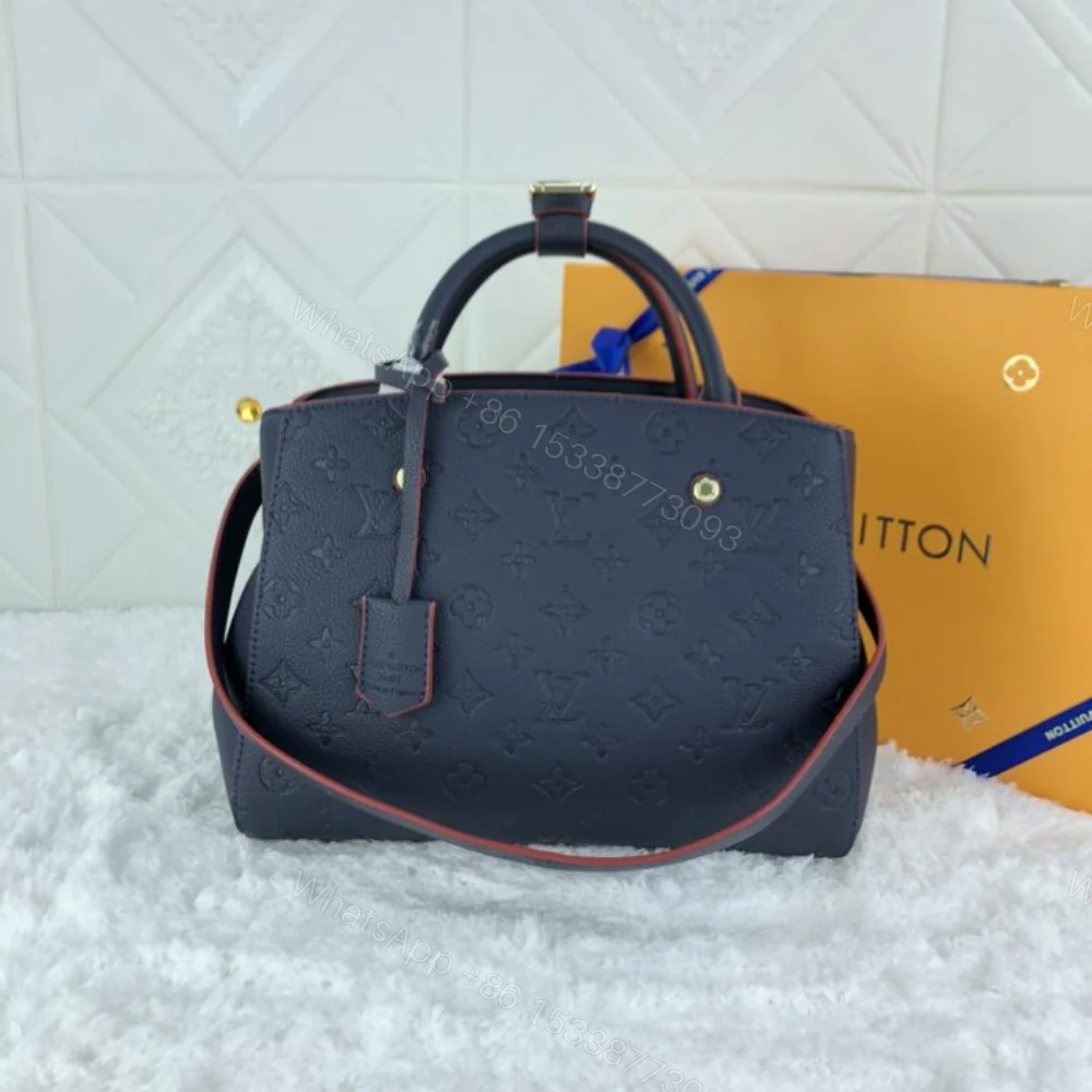View 2 of Louis Vuitton Montaigne MM Monogram Empreinte Navy Blue 33Cm M42746