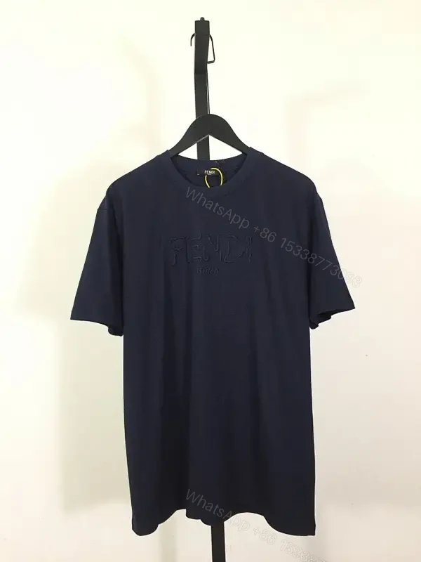 Navy Cotton Blend Tee: Subtle Logo, Relaxed Fit, Versatile — view 1