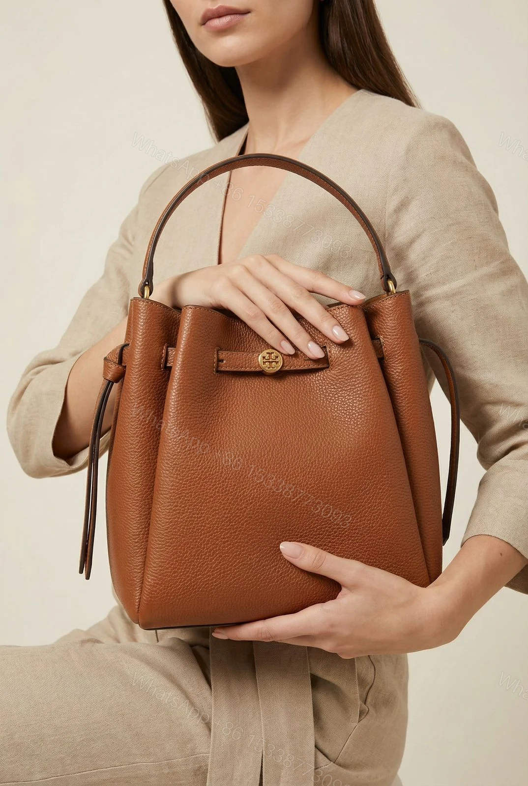 Tory Burch Romy Bucket Bag First Copy | AAA+ Replica Designer Bucket Bag — view 1