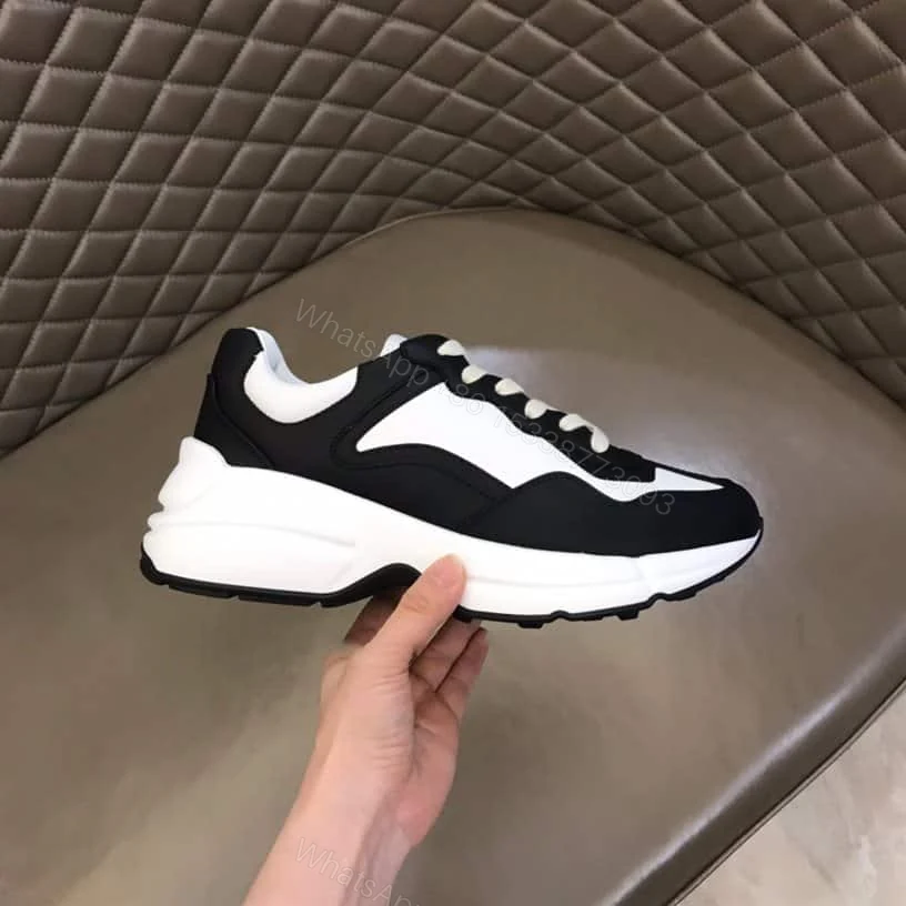 View 2 of Gucci Rhyton Low Top Sneakers In Black And White – GC124