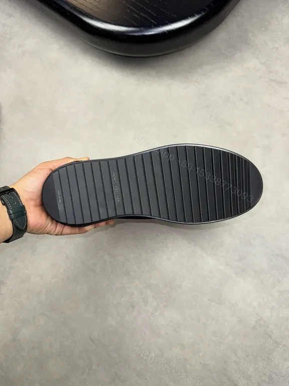 View 4 of Minimalist Black Knit Sneaker â€” Subtle LV Accent, All-Day Comfort