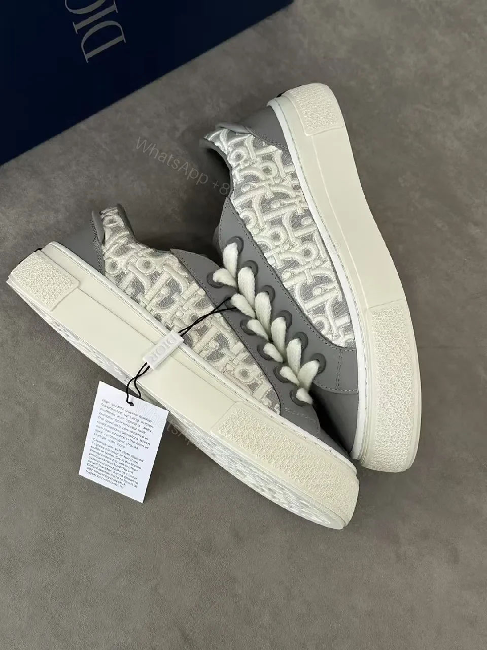 View 9 of Gray Leather Sneaker with Monogram Pattern, Luxurious Texture, Casual High-Tops