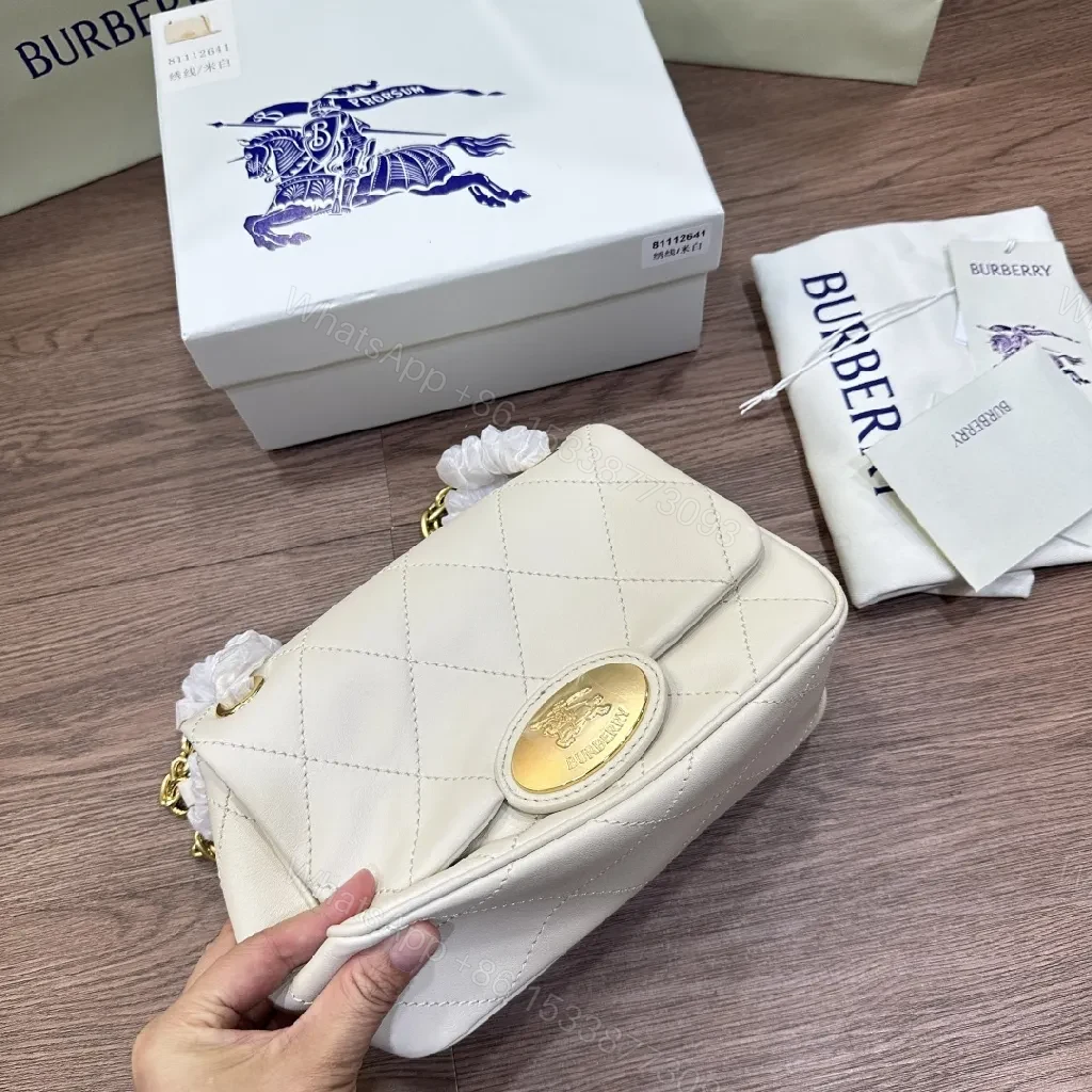 View 6 of Quilted Mini Crossbody: Diamond Stitch, Gold Hardware, Elegant Texture
