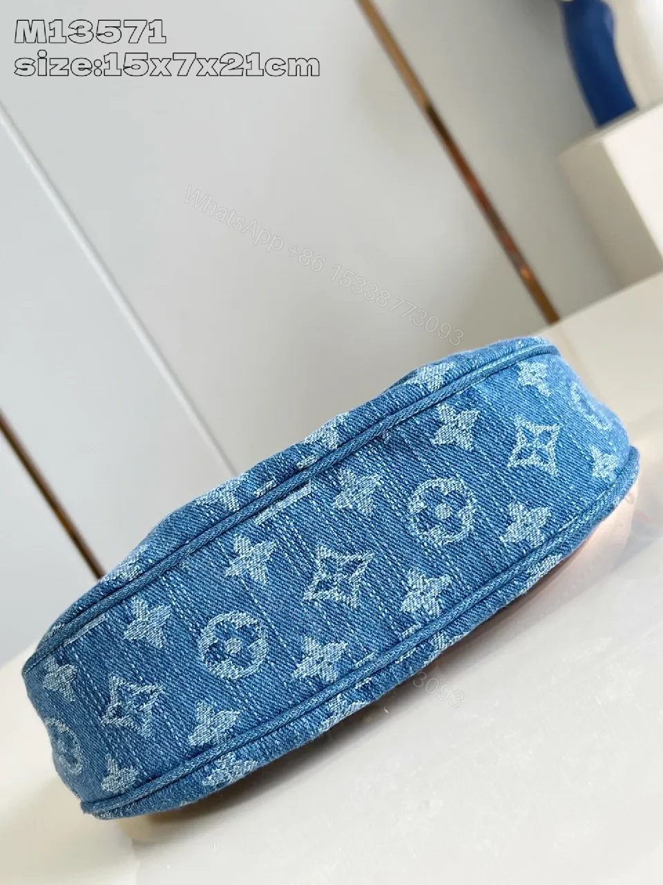 View 2 of Denim Monogram Crescent Bag: Modern, Durable, Luxury Accessory