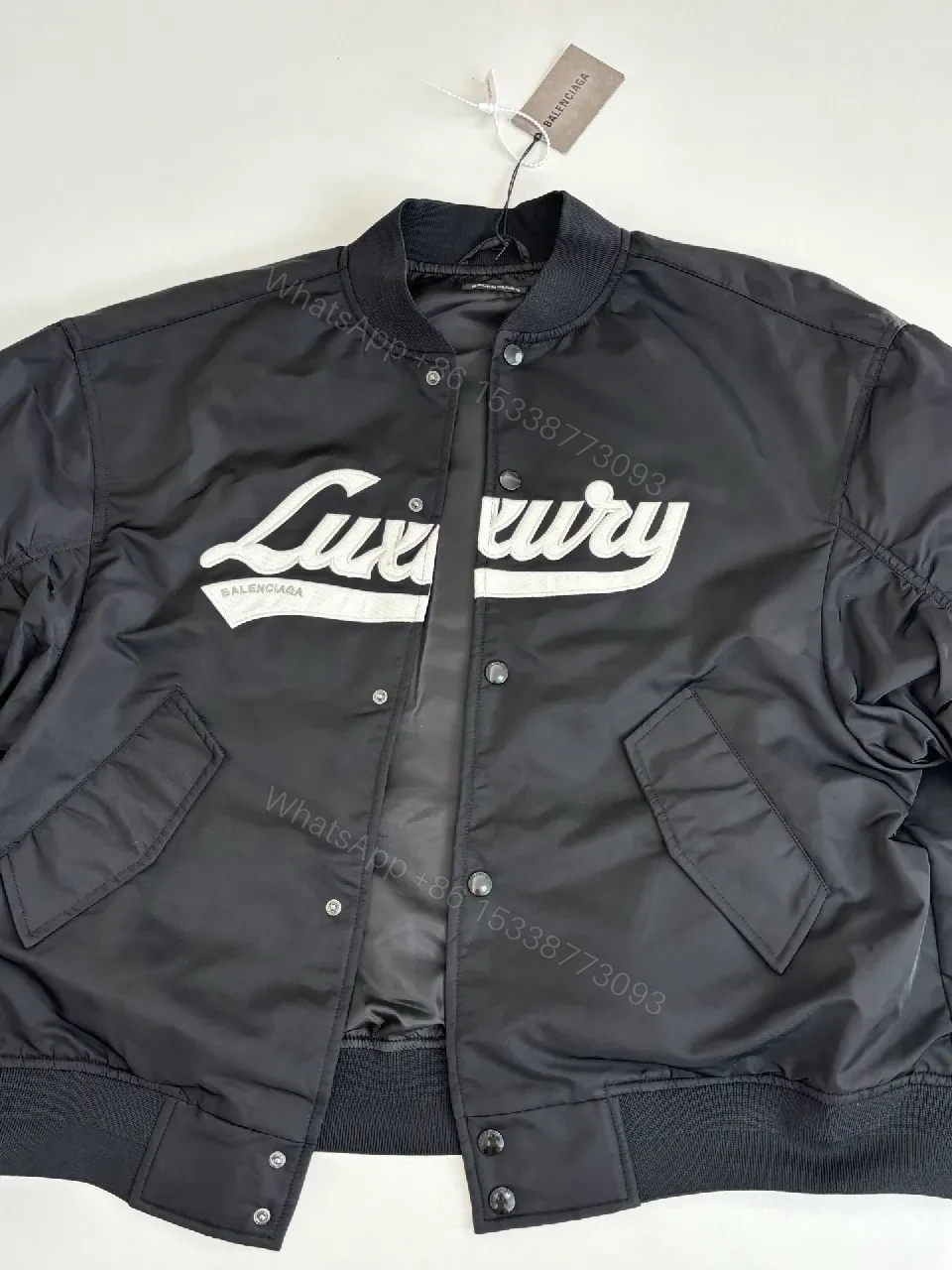 View 6 of Bold Black Logo Varsity Jacket | Luxe Streetwear Outerwear