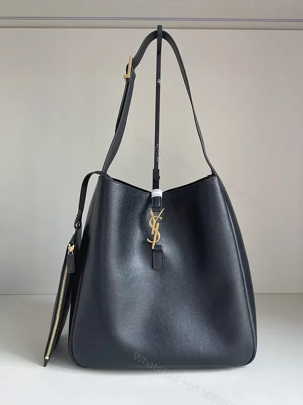 Navy Leather Bucket Bag with Gold YSL Charm and Zippered Pocket — view 1