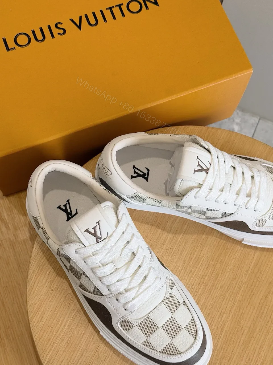 View 6 of Monochrome Checkerboard Sneakers with Signature LV Touch