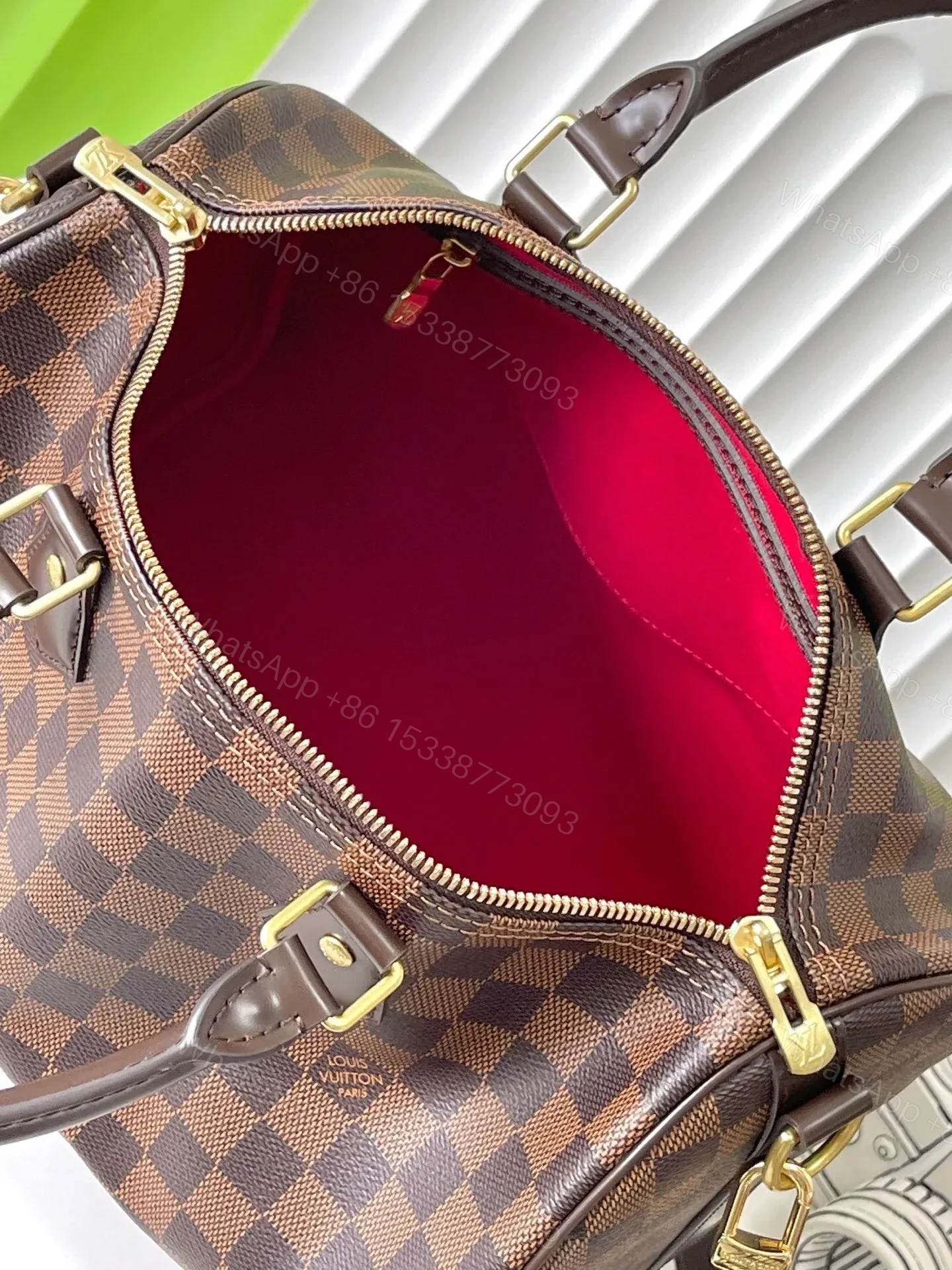 View 7 of LV SPEEDY BANDOLIÈRE 30 IN DARK BROWN DAMIER EBENE CANVAS GOLD LOCK